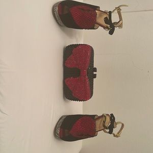 Charlotte Olympia ,Black suede peep toe with red embellishment